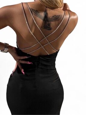 Black Mini Dress With Silver Rhinestone Criss Cross Straps On The Back